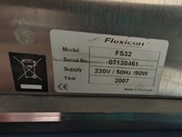 Комплекс: дозатор Flexicon PF22 и укупорщик FS32, GMP